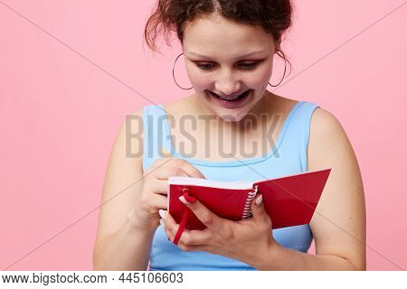 Portrait Of A Woman Copy-space Notebook Training Pink Color Background Unaltered