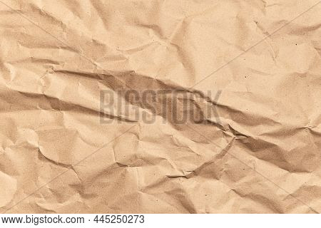 Crumpled Brown Paper Texture. Kraft Recycled Paper Background