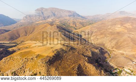 Empty Rural Road Through The Beautiful Gorge Of Kourtaliotikos In Crete Island In Greece.