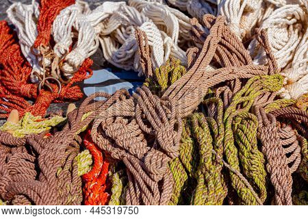 Close Up Shot Of Heap Of Braided Hemp Ropes Made For Sale At Outdoor Flea Market. Manila Ropes