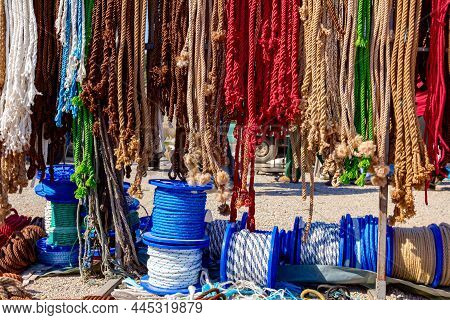 Close Up Shot Of Heap Of Braided Hemp Ropes Made For Sale At Outdoor Flea Market. Manila Ropes