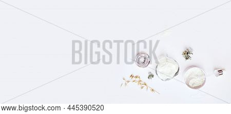 Dermatology Cosmetics On White Background. Trendy Facecare Cosmetics Set. Alginate Mask, Serum Dropl