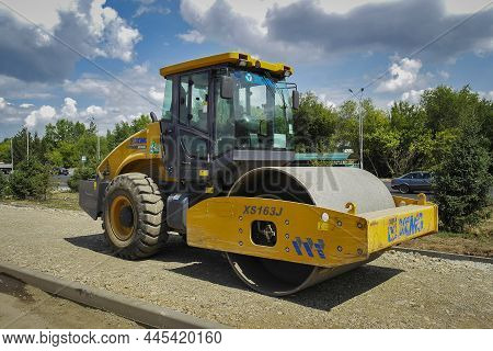 Kazakhstan, Ust-kamenogorsk, July 31, 2021: Yellow Steam Roller (road Roller). Chinese Steamroller X