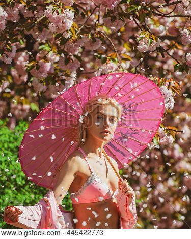 Partrait Of Sexy Young Woman. Smiling Face Of Spring Girls. Blossom Petals.