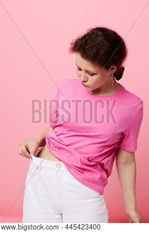 Attractive Young Woman In A Pink T-shirt Youth Fashion Lifestyle Unaltered