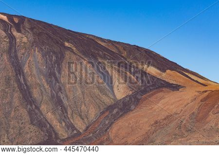 Solidified Lava Flow Of Pico Del Teide Mountain On Tenerife With Blue Sky