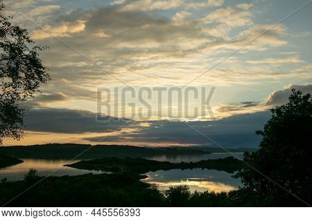 Cloudy Sunset Over The Loch Shuna In Scotland