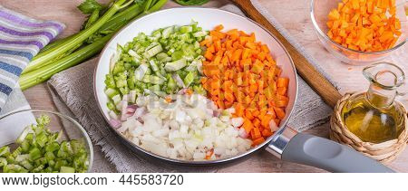 Preparation Of The Italian Classic Base For Dishes - Soffritto. Finely Chopped Onions, Carrots And C
