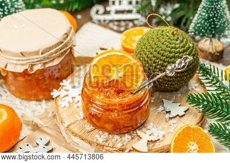 Orange Marmalade Or Orange Jam In Glass Jars. Sweet Confiture With Festive Christmas Decor