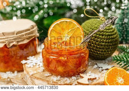 Orange Marmalade Or Orange Jam In Glass Jars. Sweet Confiture With Festive Christmas Decor