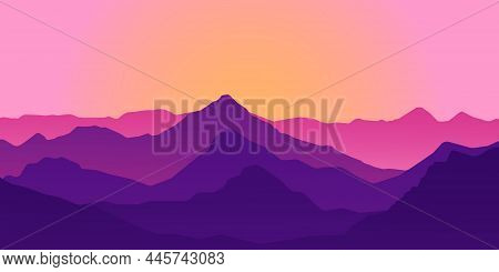 Panoramic View Of The Mountain Landscape With Fog In The Valley Below With The Alpenglow Sky