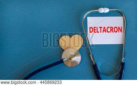 Covid-19 Deltacron Variant Symbol. The Concept Word Deltacron On Wooden Block And Stethoscope. Woode