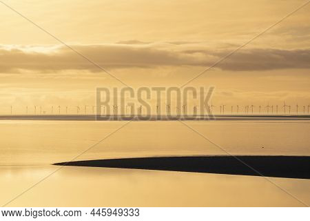 Epic Sunset Landscape Image Of Solway Firth Viewed From Silloth During Stunning Autumn Sunset With D