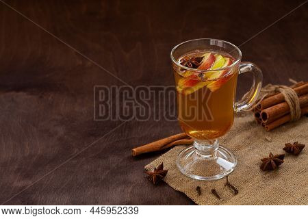 Glass Of Mulled Wine With Spices. Homemade Spice Apple Cider With Fresh Apples, Honey, Cinnamon, Car