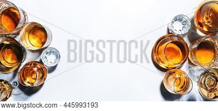 Strong Alcoholic Drinks, Hard Liquors, Spirits And Distillates In Glasses: Vodka, Cognac, Whiskey An