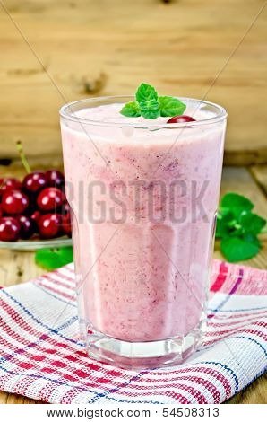 Milk Cocktail With Cherry On The Board