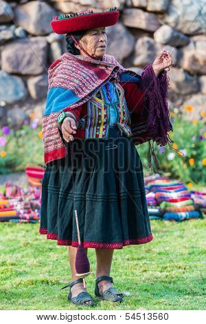 CUZCO, PERU - JULY 15: women weaving in the peruvian Andes at Cuzco Peru on july 15th, 2013. In the Andes of Peru every village has its own weaving patterns and traditions.