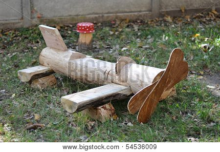 Wooden Airplane In Garden