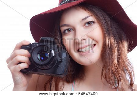 smiling woman with professional camera