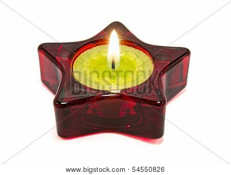 Nice green candle, inside a red star.