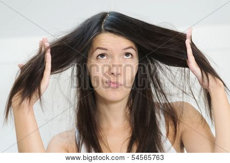 Woman Unhappy With The Condition Her Long Hair