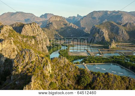 Shrimp farms and limestone mountains in Sam Roi Yot National Park, Thailand