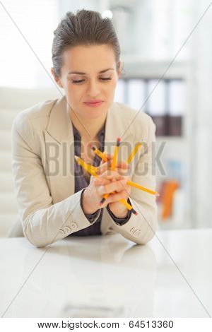 Business Woman Holding Pencils