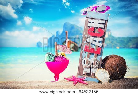 Gourmet tropical icecream dessert served alongside a sunny summer beach in an elegant dish