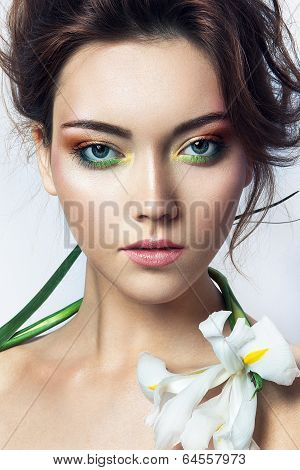 Close-up studio portrait of beautiful woman
