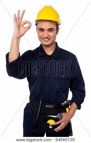 Young Male Worker Giving The Ok Sign
