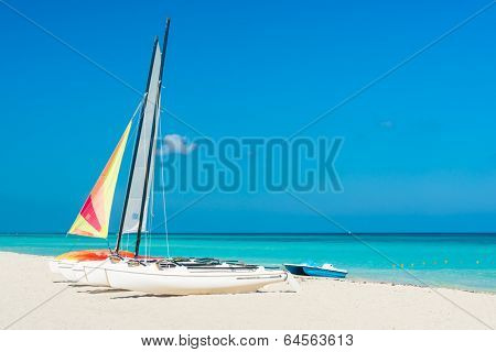 Colorful sailing boats for rent on a sunny day at Varadero beach in Cuba