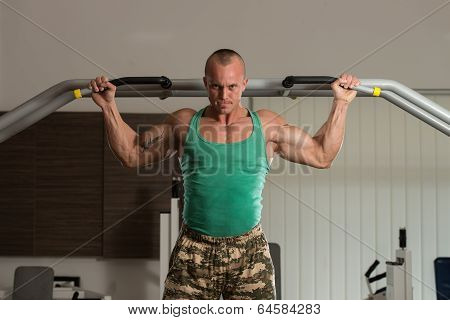 Bodybuilder Doing Pull Ups Best Back Exercises
