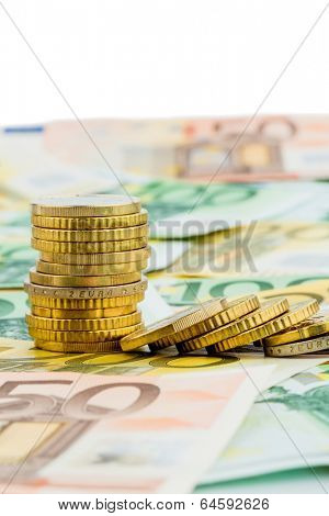 single stack of coins lying money coins symbol photo for investment, risk and profits slump