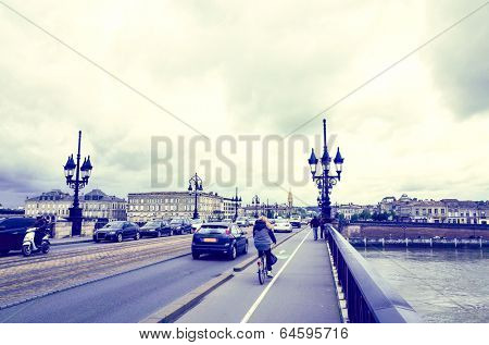 Old stony bridge in Bordeaux, France Europe