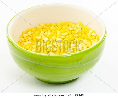 yellow bean in green cup