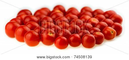 Natural, Juicy Cherry Tomatoes Isolated Against A White Background