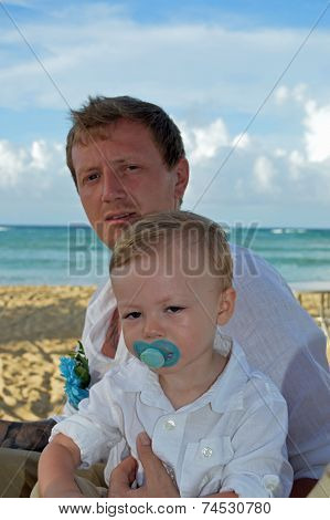 Father And Son Waiting For Mom