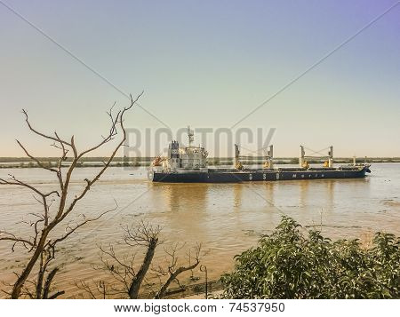 Commercial Ship Crossing The Parana River