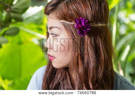 Side Profile Of Filipina Woman In A Garden