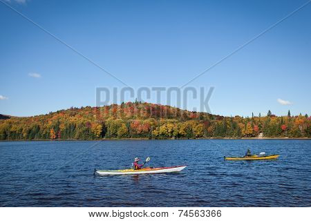 Canoeing in a lake during the fall
