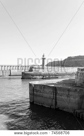 Scenic view of Whitby Pier in sunny autumn day, UK