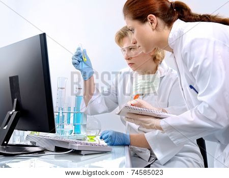 group of scientists working at the laboratory