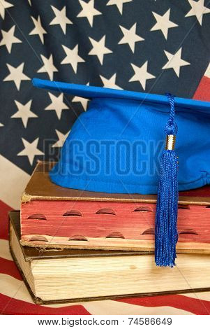 blue graduation cap with flag