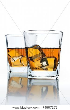 two glasses of scotch and ice