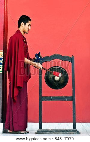 Monk Hitting the Gong