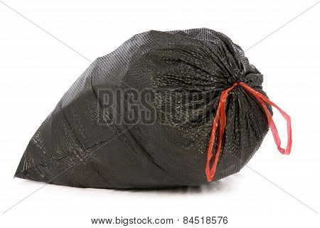 Big Black Trash Or Garbage Bag With Red Tie