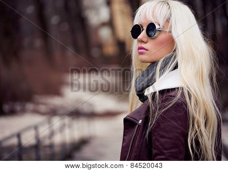 Beautiful Girl In Sunglassses Outdoors