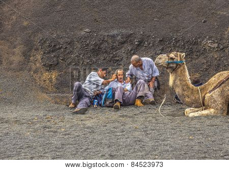 Camel Riders Wait For Tourists