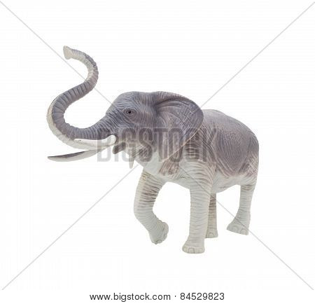 Isolated blue and grey elephant toy standing on white background angle view.