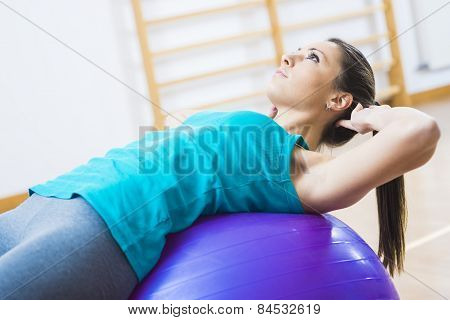 Attractive Woman Exercising With Fitness Ball
